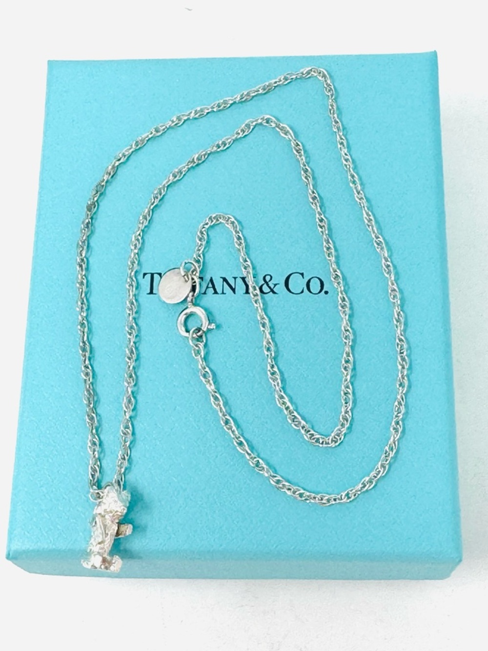 Authentic Tiffany & Co. Rare Vintage Teddy Bear Swivel Arms Necklace.